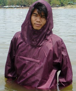anorak with purple hood in lake as modest swimsuit